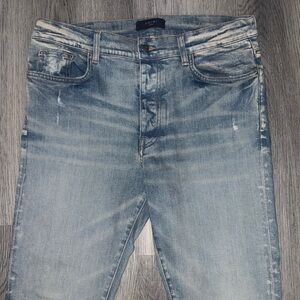 AMIRI
Clay Indigo washed-effect skinny cut jeans